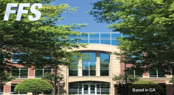 A building with trees in front of it